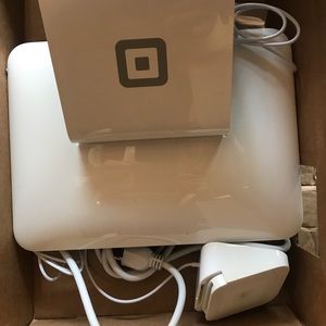 Square stand for iPad and contactless chip.